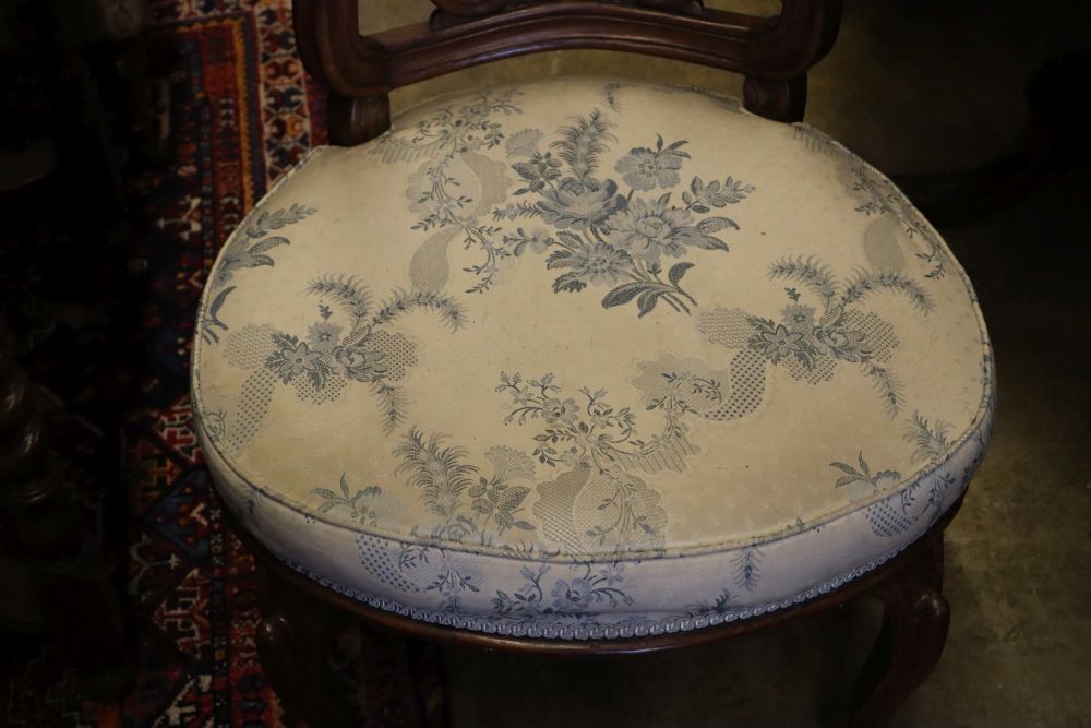 An Art Nouveau style Edwardian inlaid mahogany salon chair and an early Victorian carved rosewood salon chair (2)